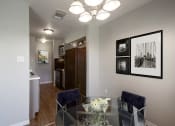 Thumbnail 6 of 64 - Dining Room and Kitchen at The Villas at Quail Creek Apartment Homes in Austin Texas