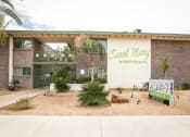 Thumbnail 15 of 23 - Exterior, landscaping & signage at Carol Mary Apartments in Phoenix, AZ