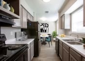 Thumbnail 18 of 64 - Full Kitchen at The Villas at Quail Creek Apartment Homes in Austin Texas