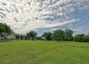 Thumbnail 45 of 64 - Grass Area at The Villas at Quail Creek Apartments in Austin Texas June 2021