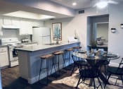 Thumbnail 1 of 40 - Kitchen and Dining Area at La Costa at Dobson Ranch Apartments