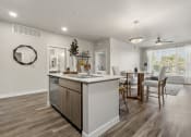 Thumbnail 7 of 48 - Kitchen and dining area at V on Broadway Apartments in Tempe AZ November 2020