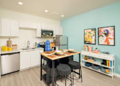 Thumbnail 9 of 11 - Kitchen and Dining of Studio at Streamliner 87th Apartments