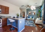 Thumbnail 5 of 19 - Kitchen and Living Room at Avilla Tanque Verde