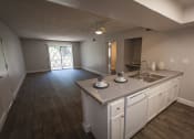Thumbnail 12 of 40 - Kitchen and Living Room at La Costa at Dobson Ranch