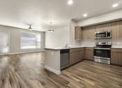 Thumbnail 30 of 48 - Kitchen and livingroom at V on Broadway Apartments in Tempe AZ November 2020