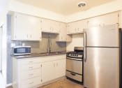 Thumbnail 8 of 23 - Kitchen at Carol Mary Apartments in Phoenix, AZ