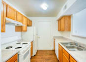 Thumbnail 1 of 10 - Kitchen at Four Hills Apartments in Las Cruces