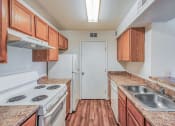 Thumbnail 1 of 10 - Kitchen at Los Altos Apartments in Las Cruces