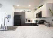 Thumbnail 2 of 23 - Kitchen at San Mateo Townhomes in Phoenix AZ July 2021 2
