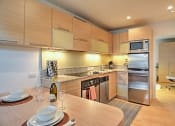 Thumbnail 3 of 60 - Kitchen at The Regency Apartments in Tempe Arizona July 2020.jpg