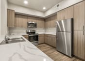 Thumbnail 29 of 48 - kitchen at V on Broadway Apartments in Tempe AZ November 2020 (4)