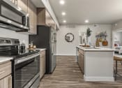 Thumbnail 9 of 48 - Kitchen at V on Broadway Apartments in Tempe AZ November 2020