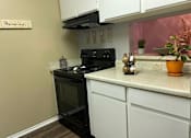 Thumbnail 5 of 13 - Kitchen at Wellington Estates Apartments in San Antonio TX