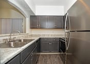 Thumbnail 19 of 65 - Kitchen at Winterhaven Terrace Apartments in Tucson Arizona
