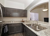 Thumbnail 30 of 65 - Kitchen at Winterhaven Terrace Apartments in Tucson Arizona