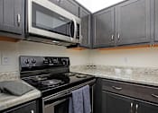 Thumbnail 31 of 65 - Kitchen at Winterhaven Terrace Apartments in Tucson Arizona