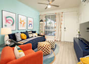 Thumbnail 8 of 11 - Living room and bedroom of Studio at Streamliner 87th Apartments