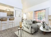 Thumbnail 3 of 65 - Living Room and Breakfast Bar at Winterhaven Apartments in Tucson Arizona