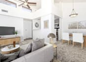 Thumbnail 4 of 65 - Living Room and Dining Room at Winterhaven Apartments in Tucson Arizona