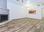 Thumbnail 12 of 65 - Living room and dining room at Winterhaven Terrace Apartments in Tucson Arizona