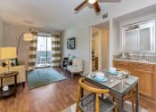 Thumbnail 1 of 19 - Living Room and Wetbar at Olive East Apartment in Gilbert Arizona