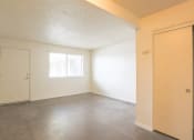 Thumbnail 5 of 23 - Living Room at Carol Mary Apartments in Phoenix, AZ