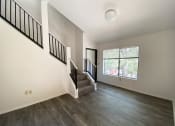 Thumbnail 7 of 23 - Living room at University West Apartments in Flagstaff AZ April 2021