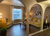 Thumbnail 3 of 13 - Living room at Wellington Estates Apartments in San Antonio TX 4-2020
