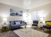 Thumbnail 4 of 43 - Living Room with Window View at The View at Catalina Apartments in Tucson Arizona