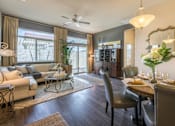 Thumbnail 15 of 34 - Living Room & Dining Area (3 Bedroom) at Palm Valley Villas in Goodyear, AZ