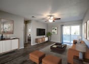 Thumbnail 14 of 64 - Livingroom with Patio at The Villas at Quail Creek Apartment Homes in Austin Texas