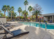 Thumbnail 8 of 19 - Lounge Seating in Pool Area at Ovation at Tempe Apartments