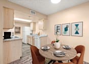 Thumbnail 2 of 24 - Dining and kitchen area at Silver Cliffs Apartments in Bullhead City Arizona