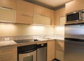 Thumbnail 19 of 60 - Kitchen (Furnished 1 Bedroom) at The Regency Apartments in Tempe, AZ