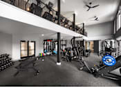 Thumbnail 12 of 28 - A spacious home gym with a variety of exercise equipment.