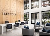 Thumbnail 25 of 28 - A modern office space with the word "LINCOLN" on the wall.