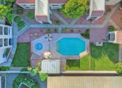 Thumbnail 24 of 29 - Pool aerial view at University Park Apartments in Tempe AZ Nov 2020