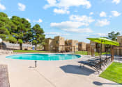 Thumbnail 22 of 32 - Pool and Lounge Area at Copper Ridge Apartments in Kingman Arizona