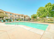 Thumbnail 8 of 10 - Pool at Four Hills Apartments in Las Cruces