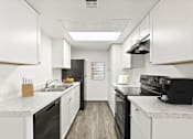 Thumbnail 6 of 24 - kitchen at Silver Cliffs Apartments in Bullhead City Arizona