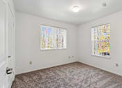 Thumbnail 7 of 28 - Two Window Bedroom at Pinehurst at Flagstaff in Flagstaff Arizona
