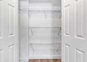 Thumbnail 31 of 37 - the closet in a bedroom with white walls and white doors at The Meriden, Connecticut, 06450