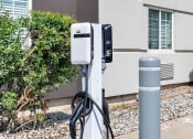 Thumbnail 27 of 37 - a charging station on the side of a sidewalk at The Meriden, Connecticut, 06450