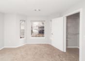 Thumbnail 18 of 22 - Carpeted Living Area at Ardenwood Apartments, Connecticut, 06473