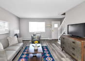 Thumbnail 25 of 39 - Living Room With TV at Encore 99, East Haven, Connecticut
