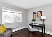 Thumbnail 20 of 39 - a living room with a couch and a desk and a window at Encore 99, Connecticut, 06512