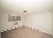Thumbnail 25 of 27 - a empty room with a window and a ceiling fan at Five High, West Hartford, Connecticut