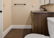 Thumbnail 5 of 24 - a small bathroom with a toilet and a sink at Retro 511 Apartments, West Haven, 06516