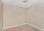 Thumbnail 20 of 24 - a empty room with beige walls and a ceiling fan at Retro 511 Apartments, Connecticut